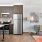 a kitchen and a living room with a couch and a table J Malden Center luxury apartments Malden MA 