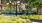 a group of tables and chairs in outdoor courtyard  J Malden Center luxury apartments for rent Malden MA 