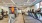 treadmills and cardio machines in fitness center with lighting