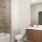 a bathroom with a tub toilet and sink J Malden Center luxury apartments for rent Malden MA 
