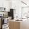 kitchen appliances with white cabinets and oversized windows J Malden Center luxury apartments Malden MA 