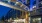 building exterior with glass walls and a bridge J Malden Center apartments on Orange line Boston 