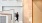 person walking in a mailroom hallway J Malden Center luxury apartments for rent Boston 