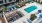 courtyard area with seating and a large swimming pool J Malden Center luxury apartments for rent Boston 