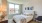 a bedroom with a bed and a window J Malden Center luxury apartments for rent Malden MA 