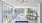 room with  pool table and chairs and a large glass door J Malden Center apts Malden MA 
