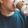 man drinking a coffee indoors